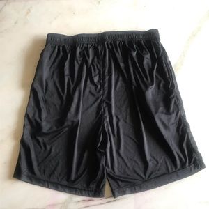 Brand: Teams  black shorts.